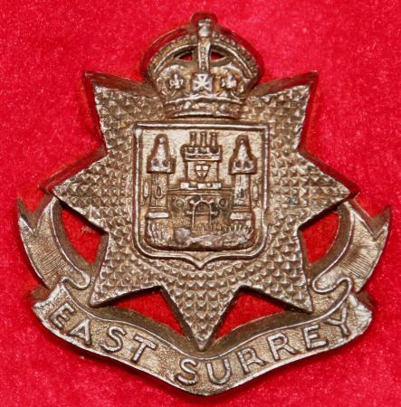 East Surrey Regt Plastic Cap Badge