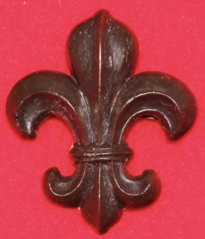 Manchester Regt Plastic Cap Badge