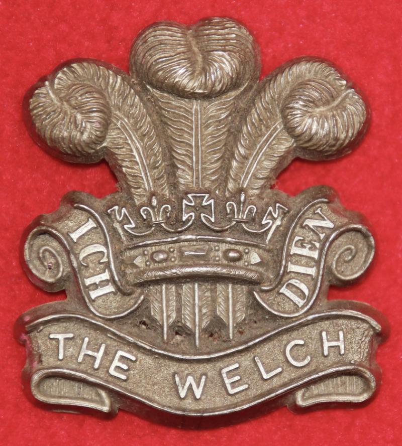 The Welch Regt Plastic Cap Badge