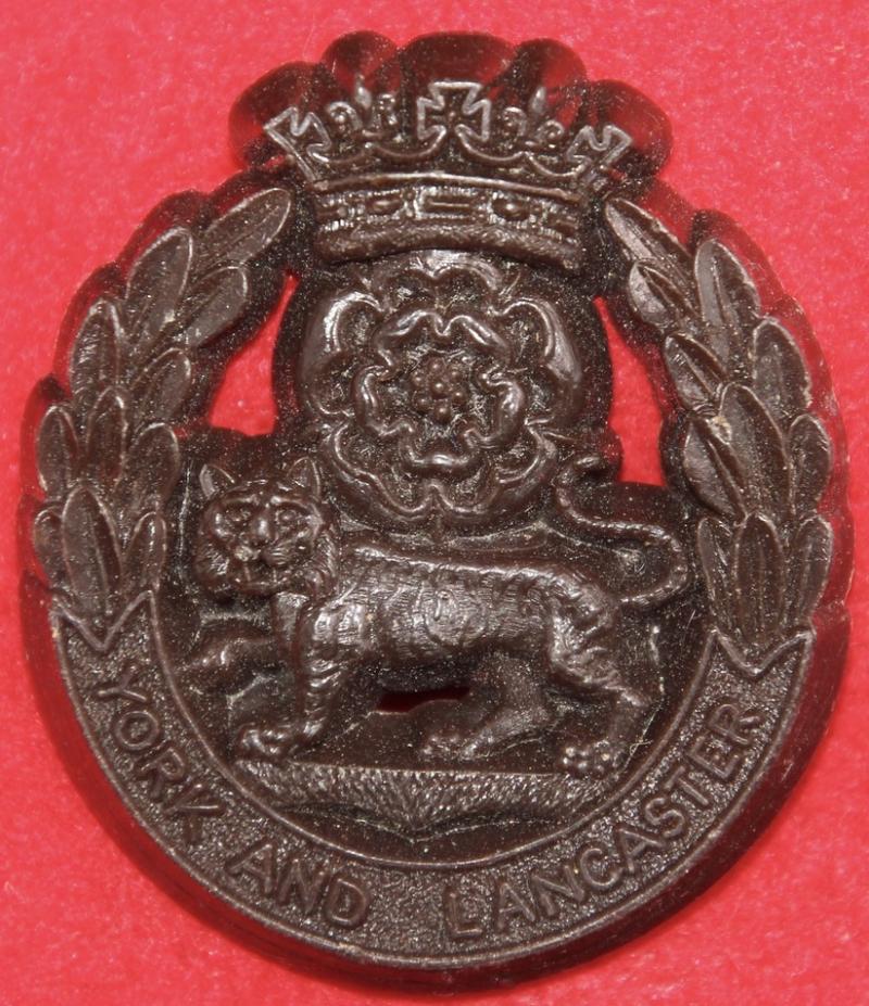 Y&L Plastic Cap Badge