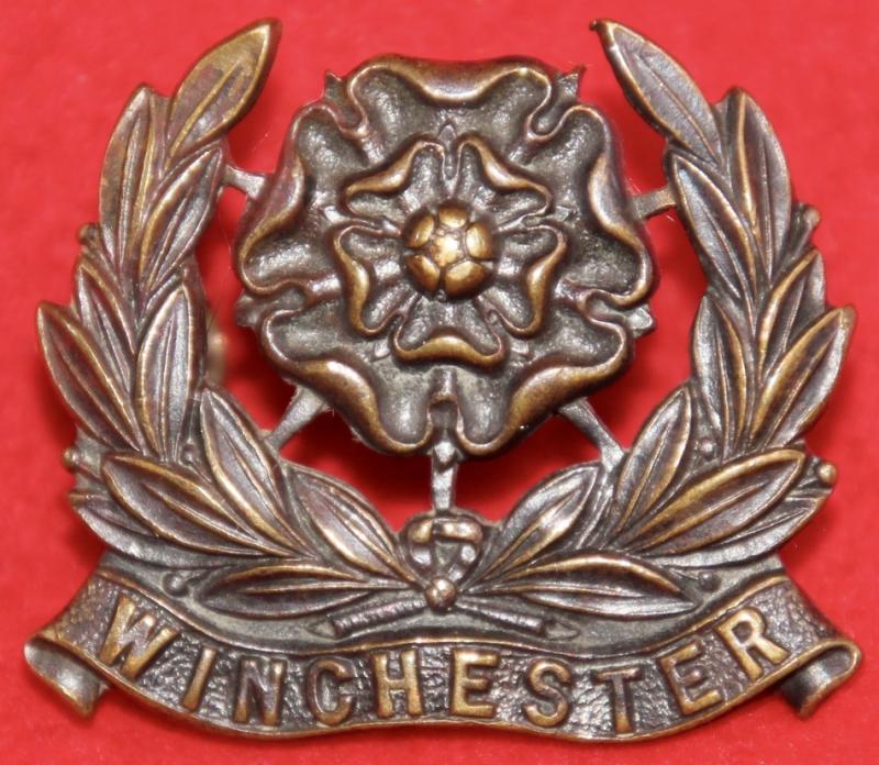 Winchester School Cap Badge