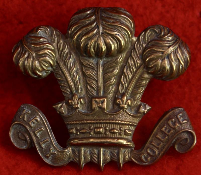 Kelly College Cap Badge