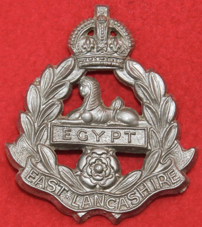 E Lancs Plastic Cap Badge